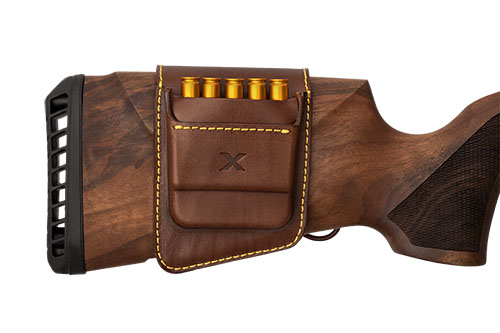 WOOX Shotgun Shell Carrier on kestävä ja tyylikäs lisävaruste, joka tarjoaa nopean pääsyn ammuksiin ja parantaa ampumakokemustasi.
